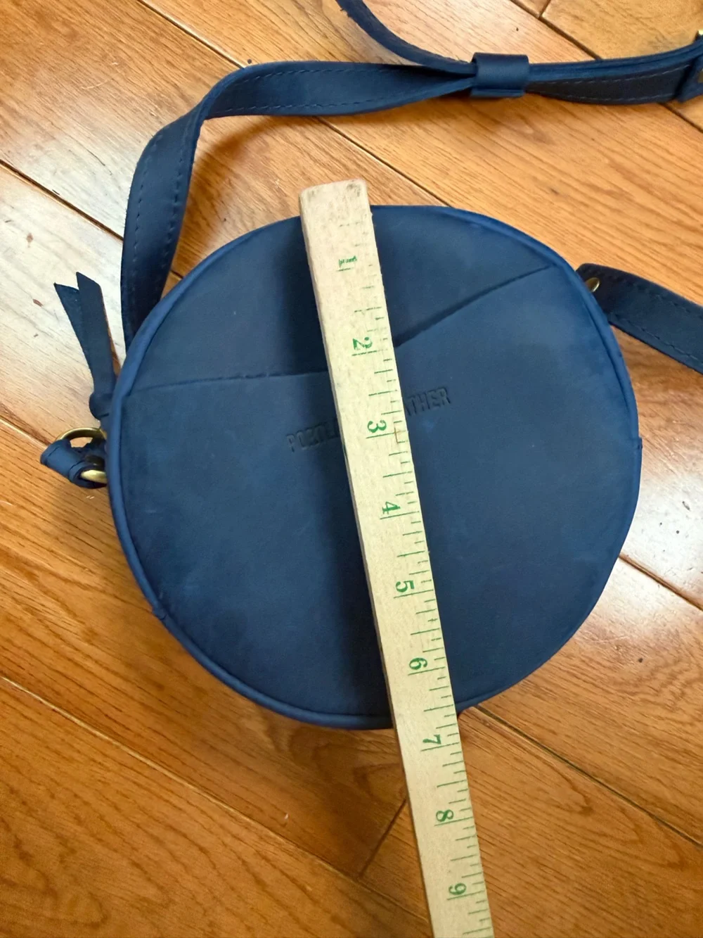 Portland Leather Nubuck Leather Small Round Crossbody Bag
